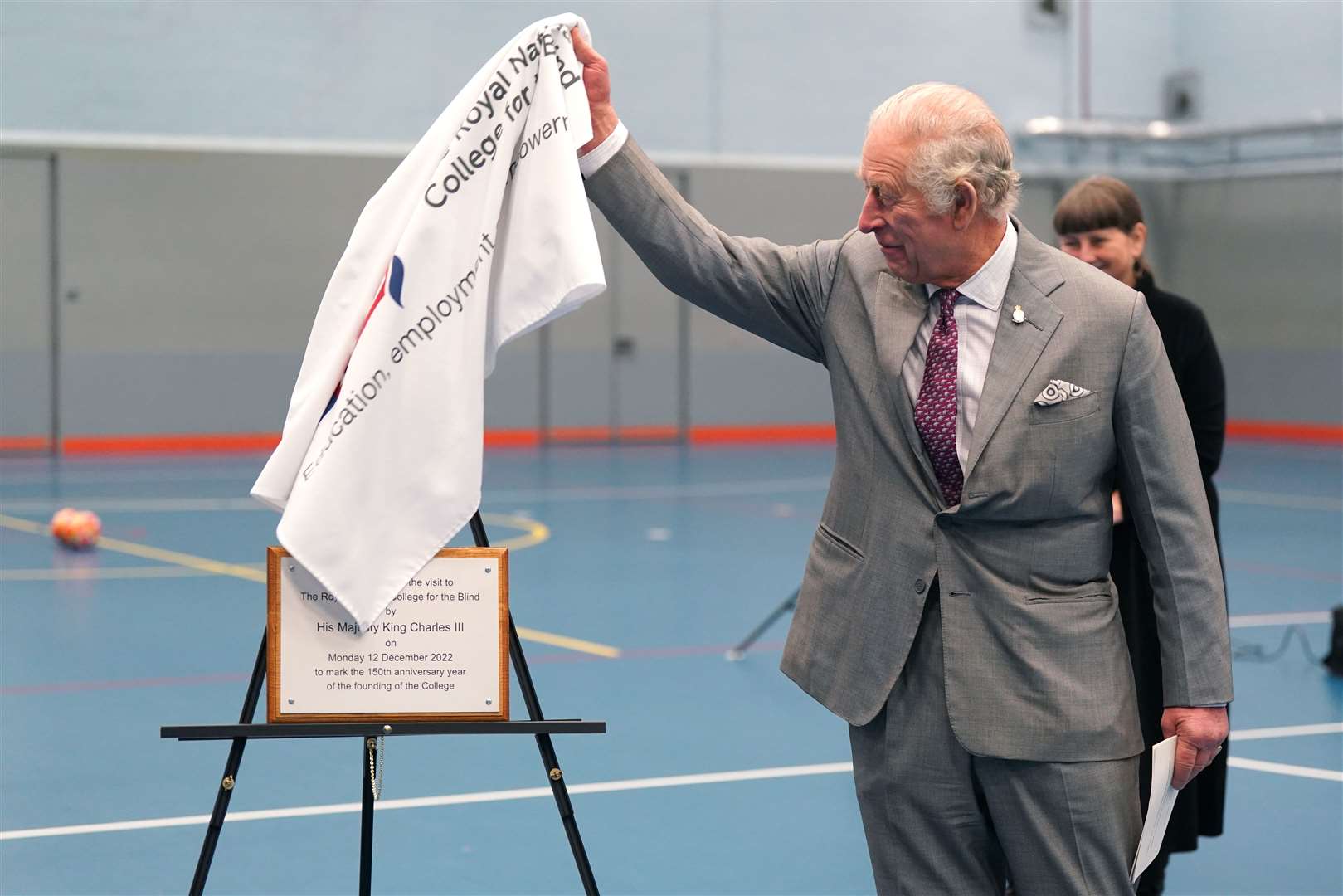 Charles unveils a plaque (Jacob King/PA)