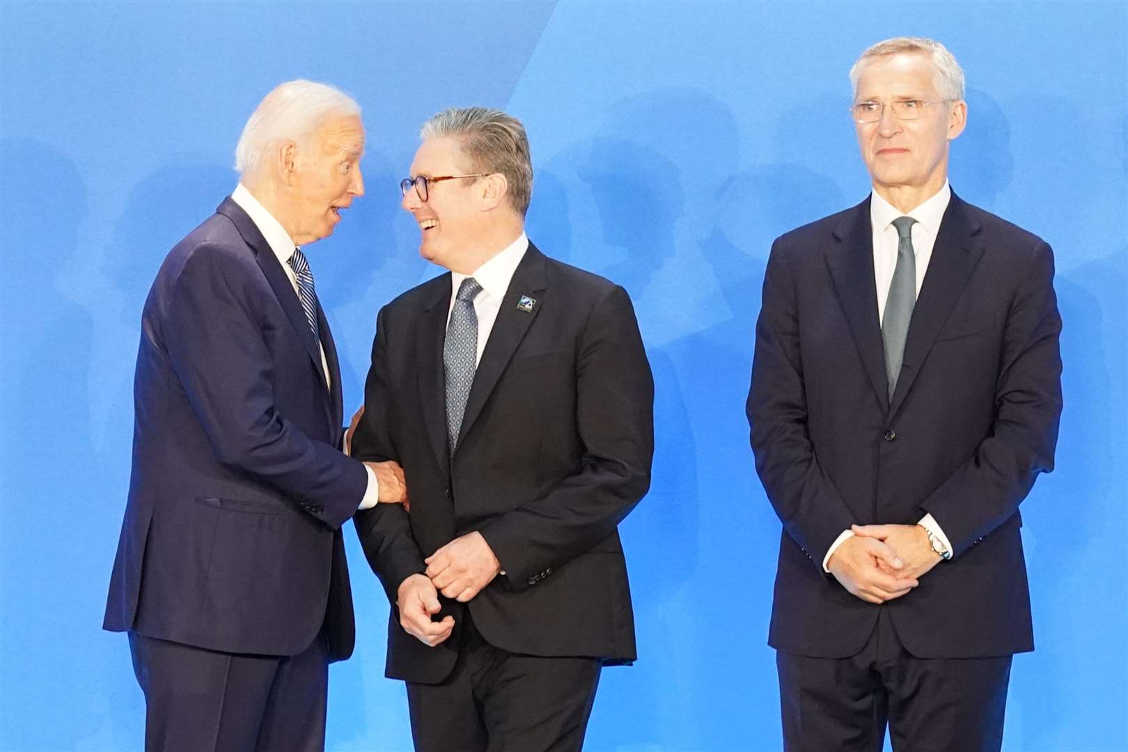 Prime Minister Sir Keir Starmer is greeted by US President Joe Biden and Nato secretary general Jens Stoltenberg as he arrives at the Nato 75th anniversary summit (Stefan Rousseau/PA)