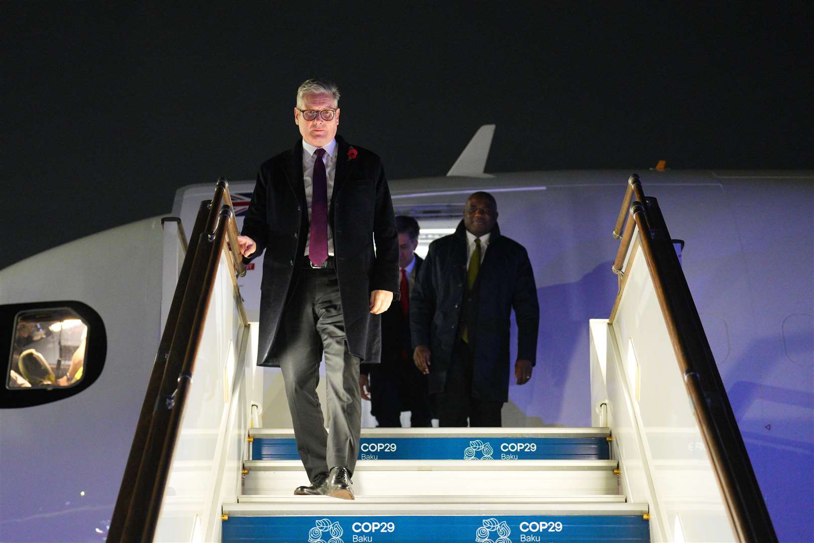 Prime Minister Sir Keir Starmer and Foreign Secretary David Lammy arriving at Heydar Aliyev International Airport to attend the Cop29 climate summit in Baku, Azerbaijan (Carl Court/PA)