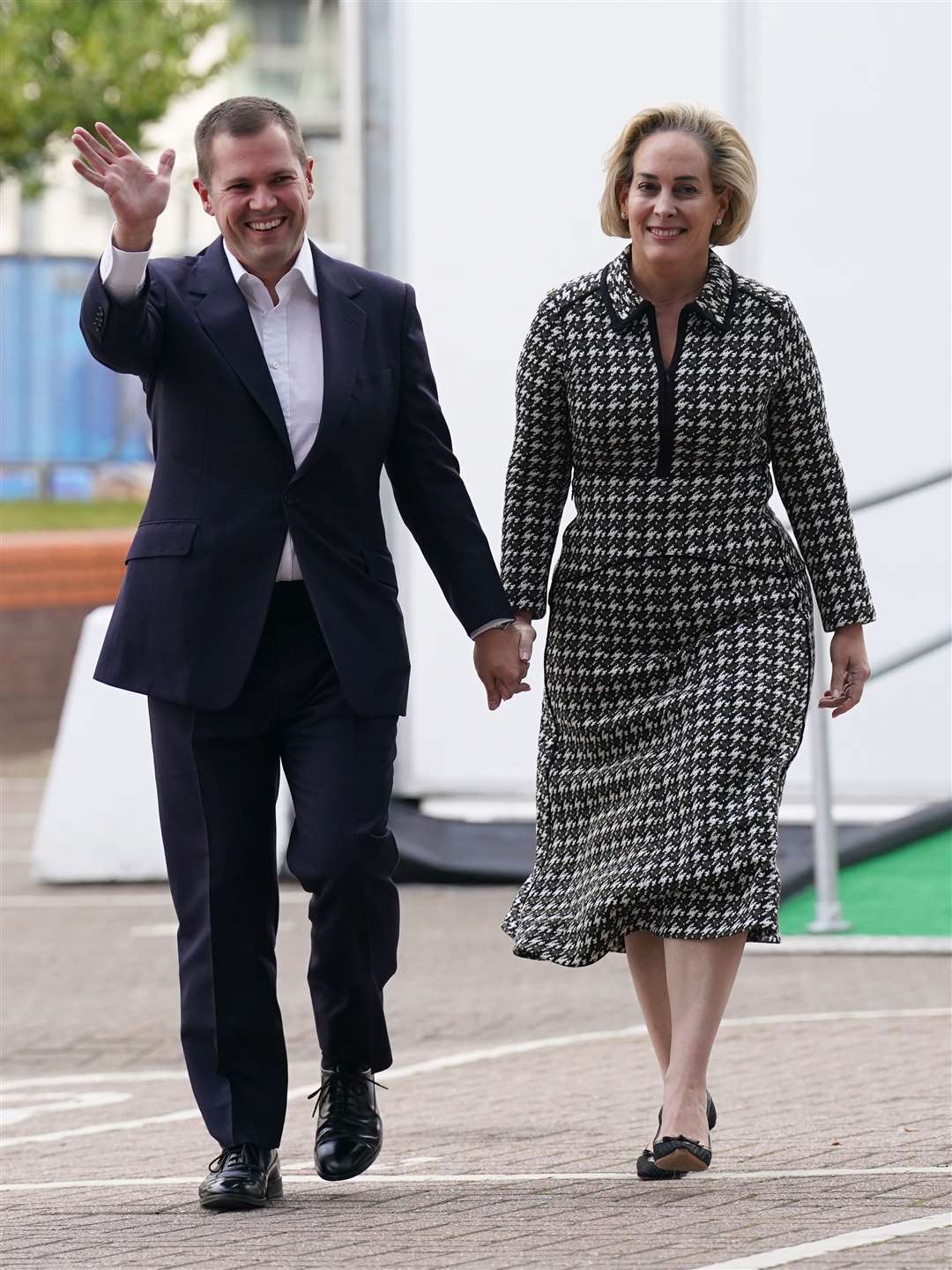 Robert Jenrick with his wife Michal Berkner arriving in Birmingham (Stefan Rousseau/PA)