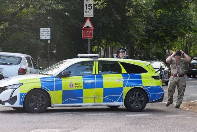 Officers at the scene in Sally Port Gardens in Gillingham. Picture: Gareth Fuller/PA