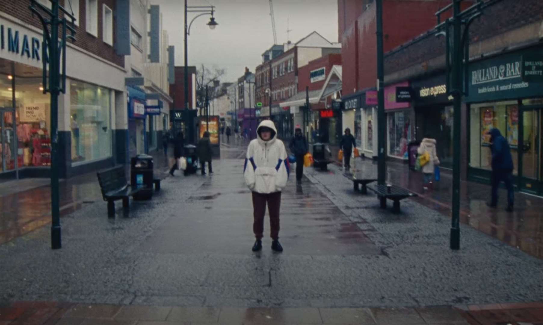 Singer venbee pictured in Chatham High Street, with Primark and charity store Wisdom Hospice. Picture: venbee/YouTube