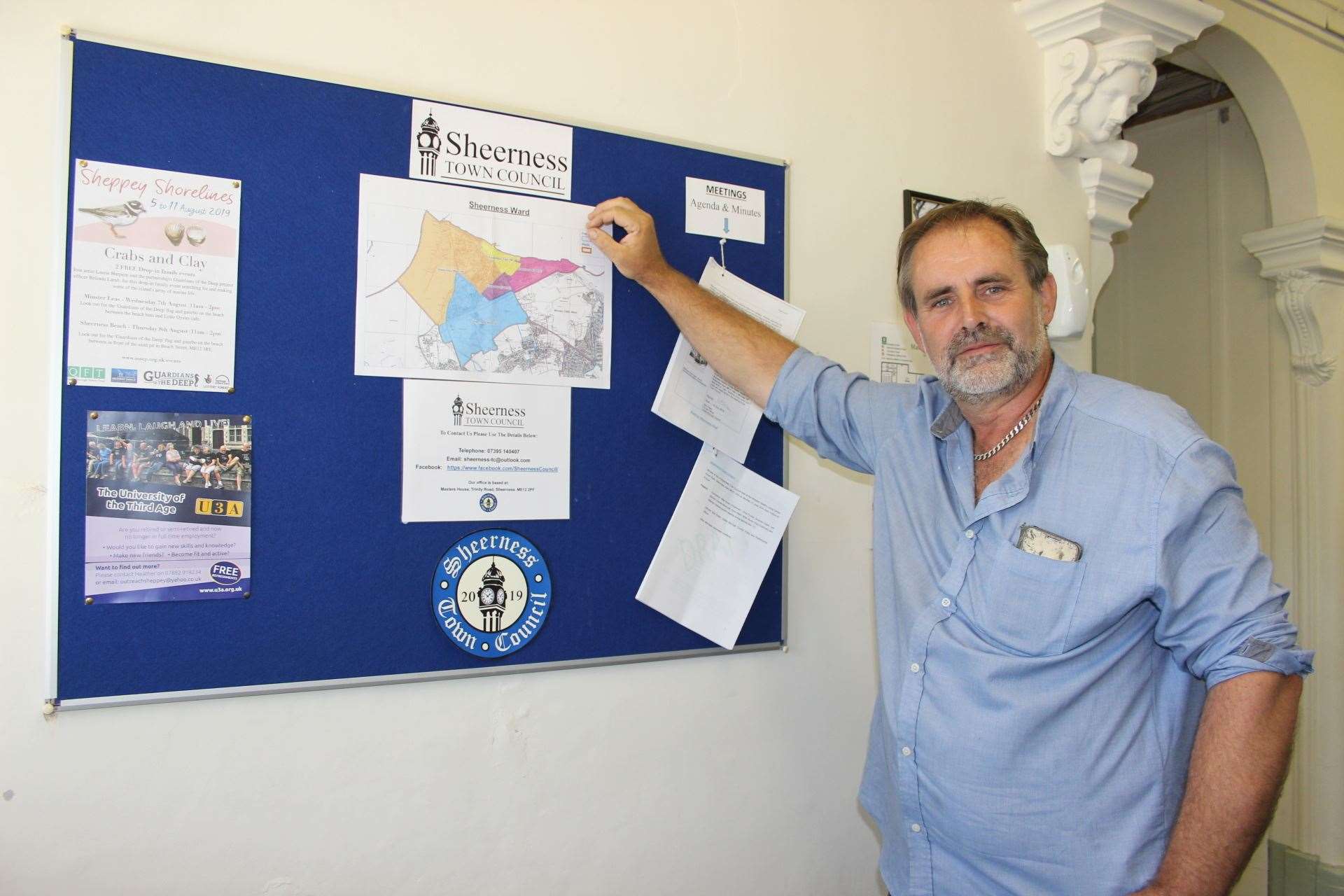 Sheerness Town Council chairman Matt Brown with the new notice board in the council offices in Trinity Road, Sheerness (15153549)