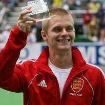 Ashley Jackson receives his International Hockey Federation Young Player of the Year award