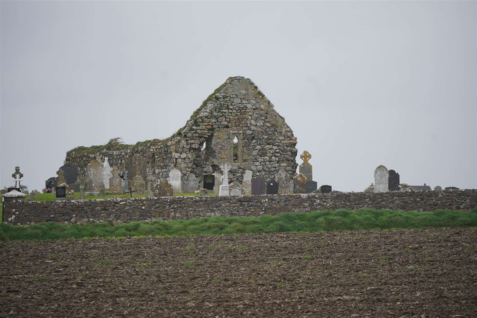 A view of the church ruins and Kilwirra cemetery, where the relatives of US President Joe Biden are buried (Niall Carson/PA)