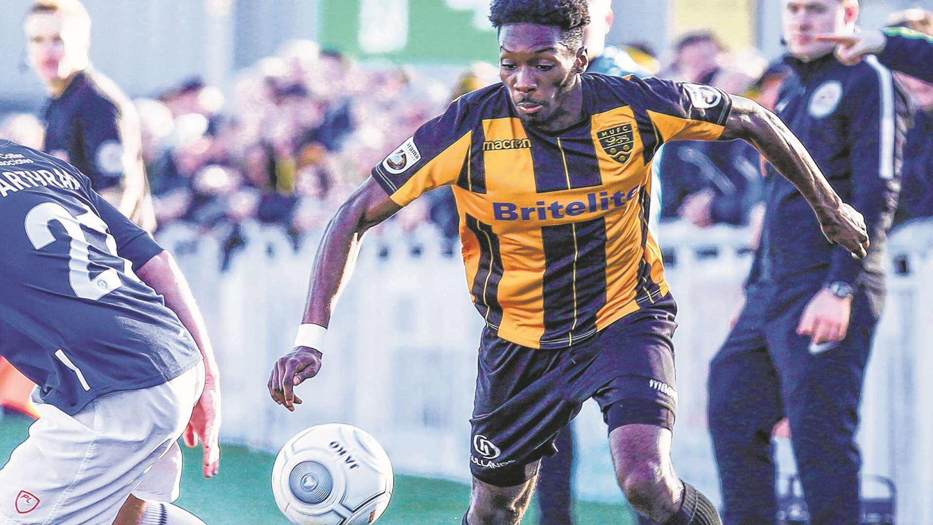 Maidstone United star Blair Turgott (right) denied fraud