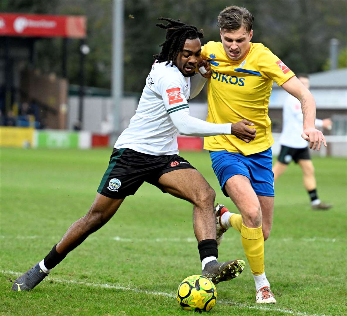 Dover defender Roman Charles-Cook in the thick of the action. Picture: Barry Goodwin