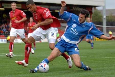 Matt Jarvis tackles Crewe full-back Jon Otsemobor. Picture: BARRY GOODWIN