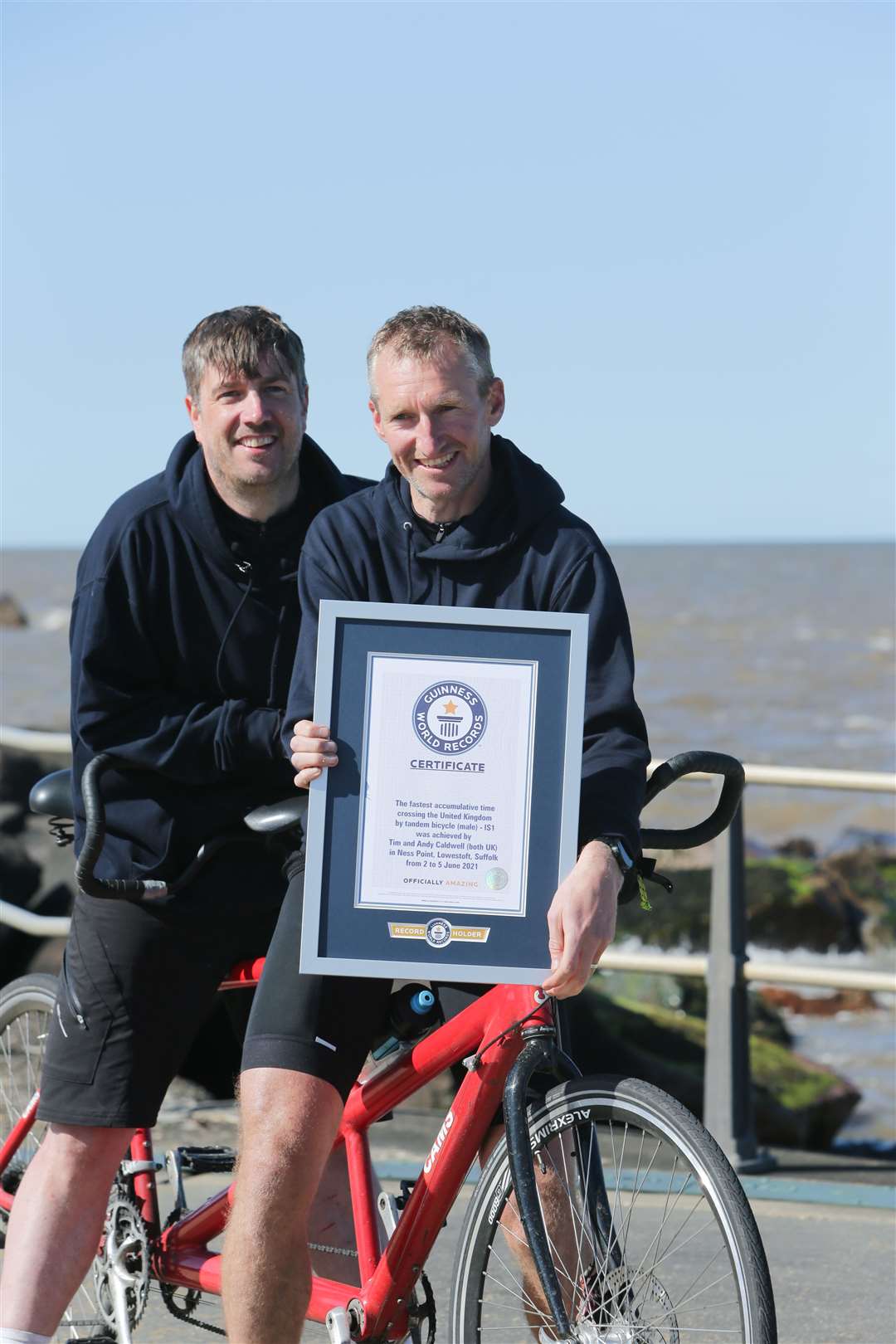 Tim Caldwell (left) and his cousin Andy cycled from St David’s to Lowestoft (Guinness World Records)