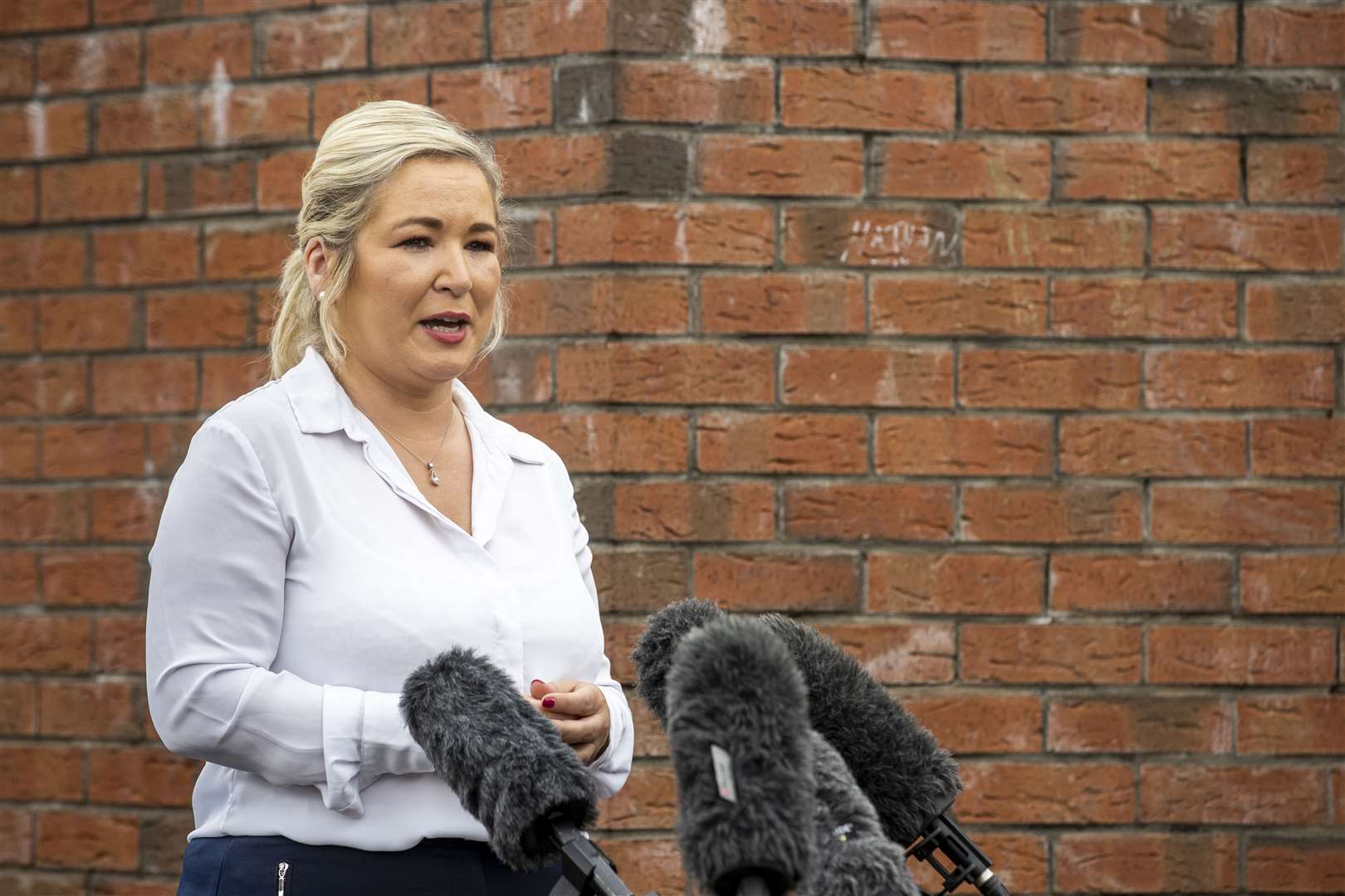 Deputy First Minister Michelle O’Neill said nationalist residents living near a bonfire in an interface area had been ‘under siege’ (Liam McBurney/PA)