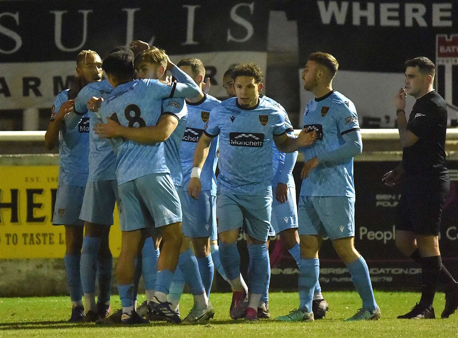 Antony Papadopoulos congratulated by Bivesh Gurung (No.18) and team-mates after putting Maidstone 2-1 up at Bath. Picture: Steve Terrell