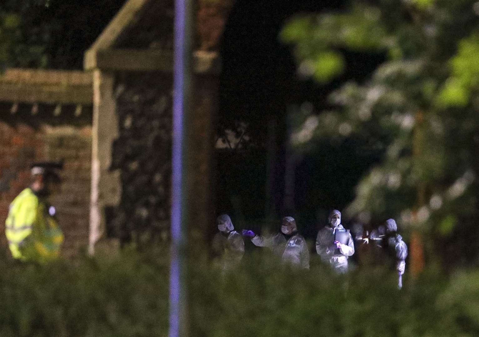 Forensic officers at Forbury Gardens on Saturday night (Steve Parsons/PA)