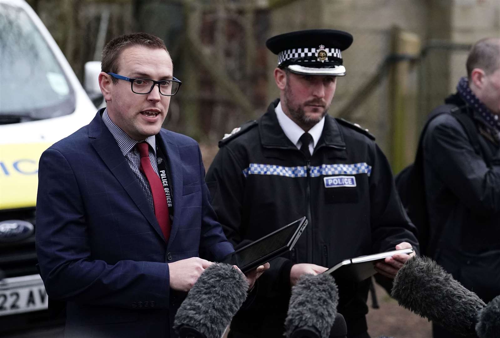 Detective Superintendent Lewis Basford and Superintendent James Collis speaking to the media outside Roedale Valley Allotments, West Sussex (Jordan Pettitt/PA)