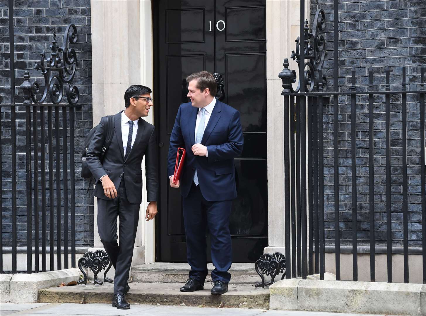 Rishi Sunak and Robert Jenrick leaving No 10 after a meeting of Boris Johnson’s Cabinet (Victoria Jones/PA)