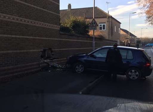 The car crashed into the side of the house