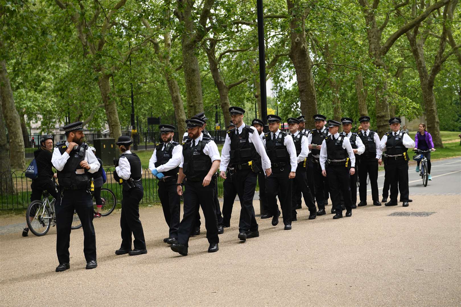 Officers on patrol in the park (Stefan Rousseau/PA)