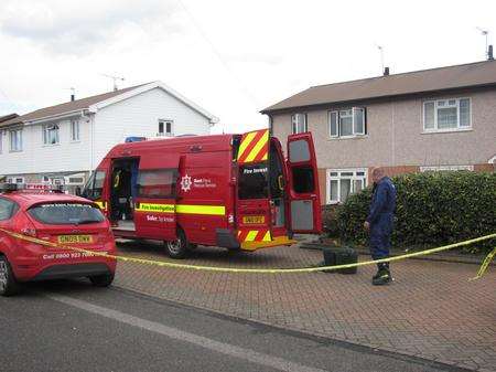 Fire investigators at the scene of the blaze in Kingsley Avenue, Dartford