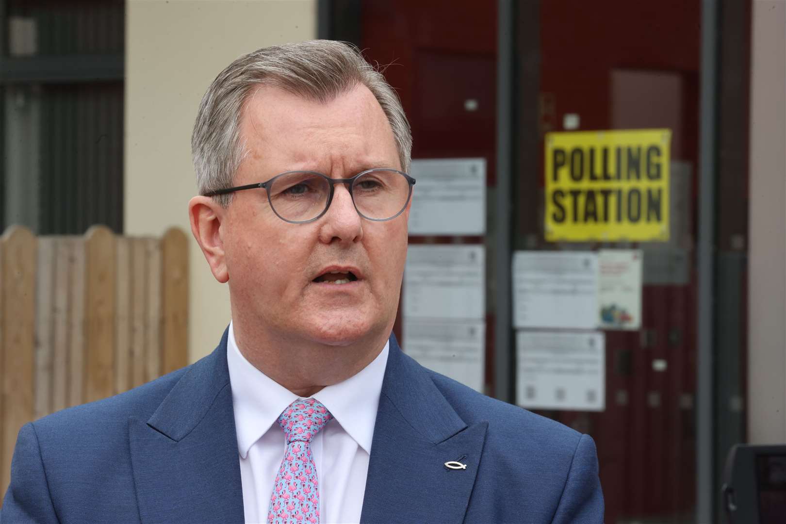 Leader of the DUP Sir Jeffrey Donaldson speaks to the media at Dromore Central Primary School polling station in Dromore, County Down after casting his vote in the Northern Ireland council elections (Liam McBurney/PA)