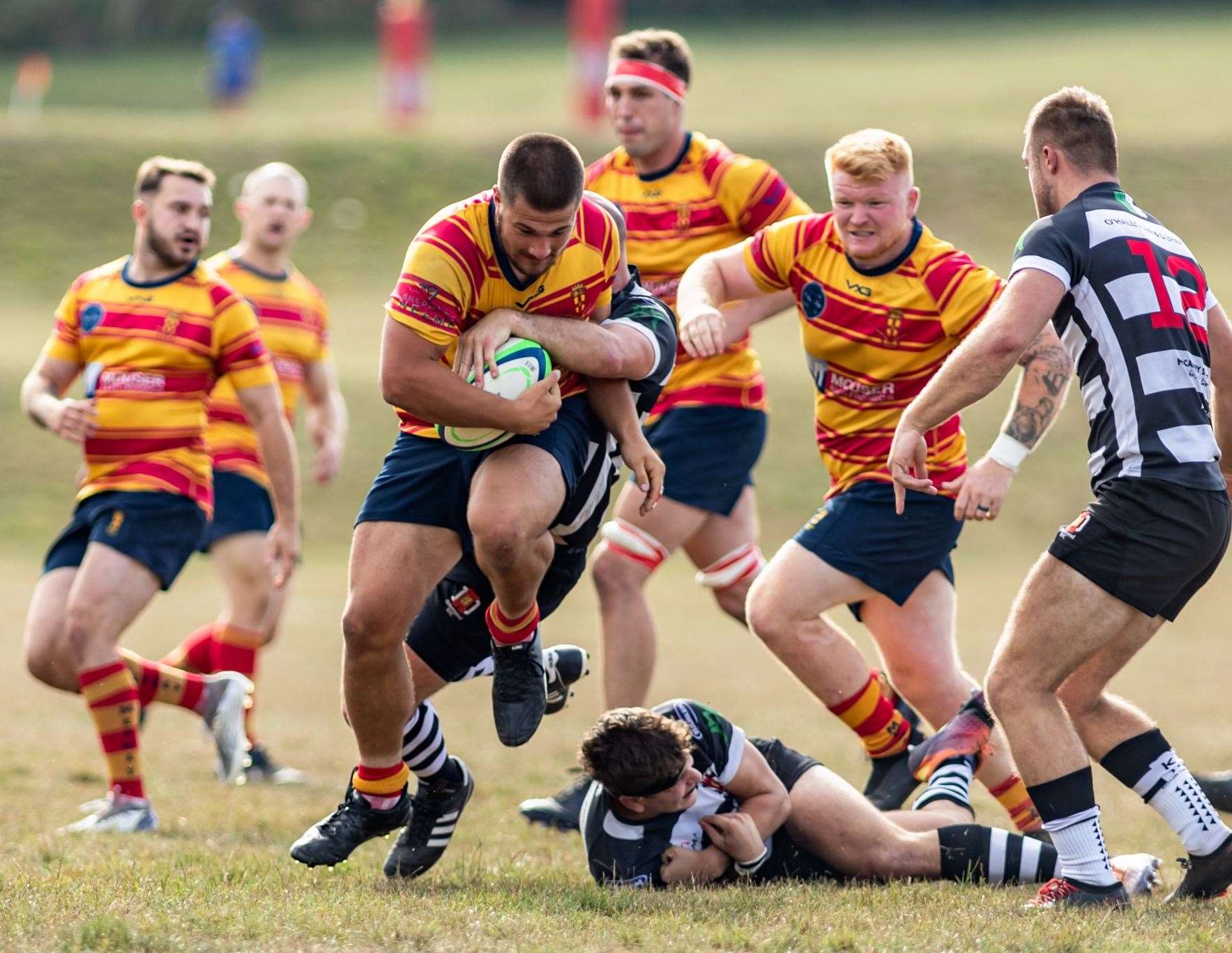 Gravesend try to get to grips with Medway's Adam Richards Shaw. Picture: Jake Miles Photography