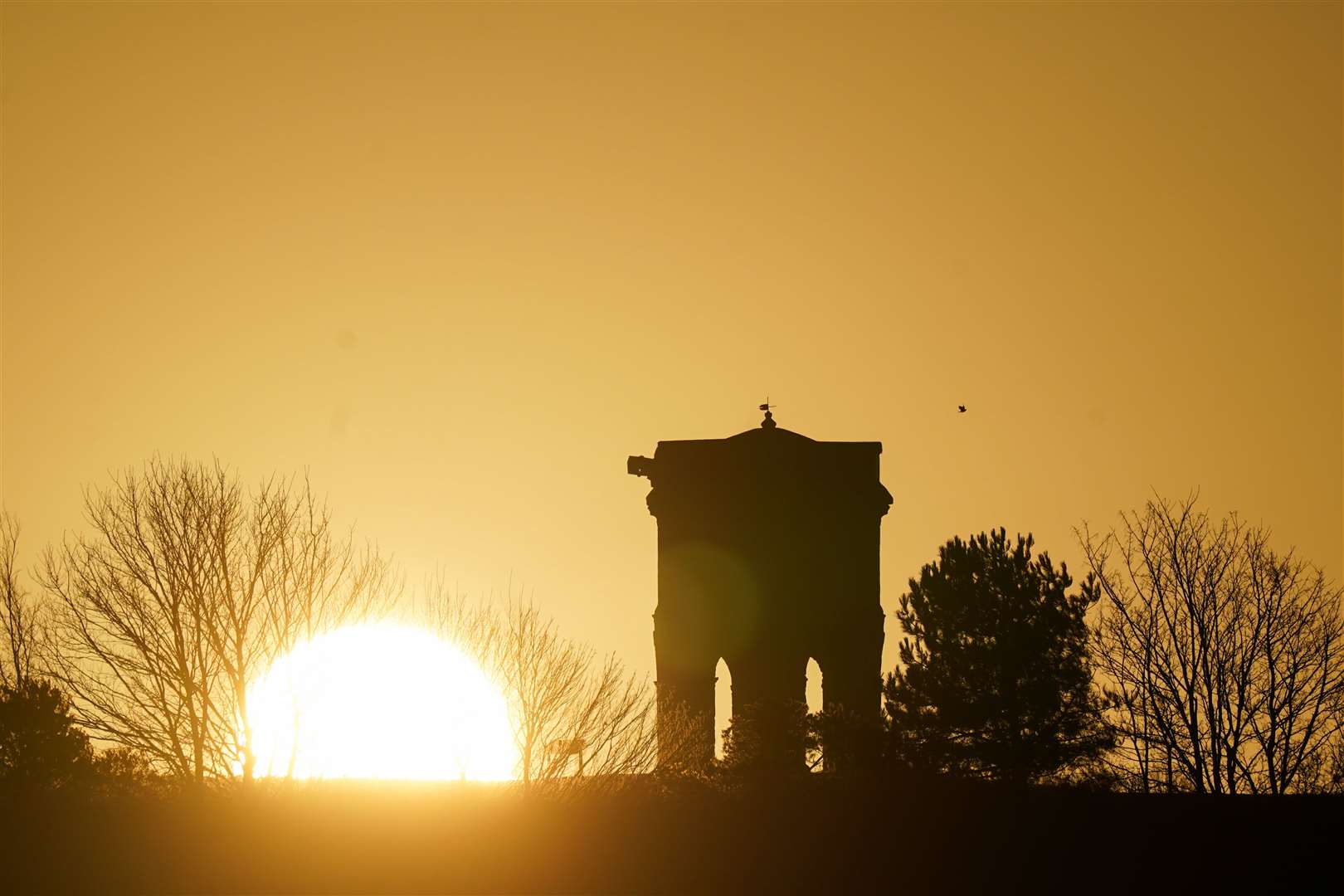 Sunrise over Chesterton Windmill in Warwickshire heralded lower temperatures (Joe Giddens/PA)