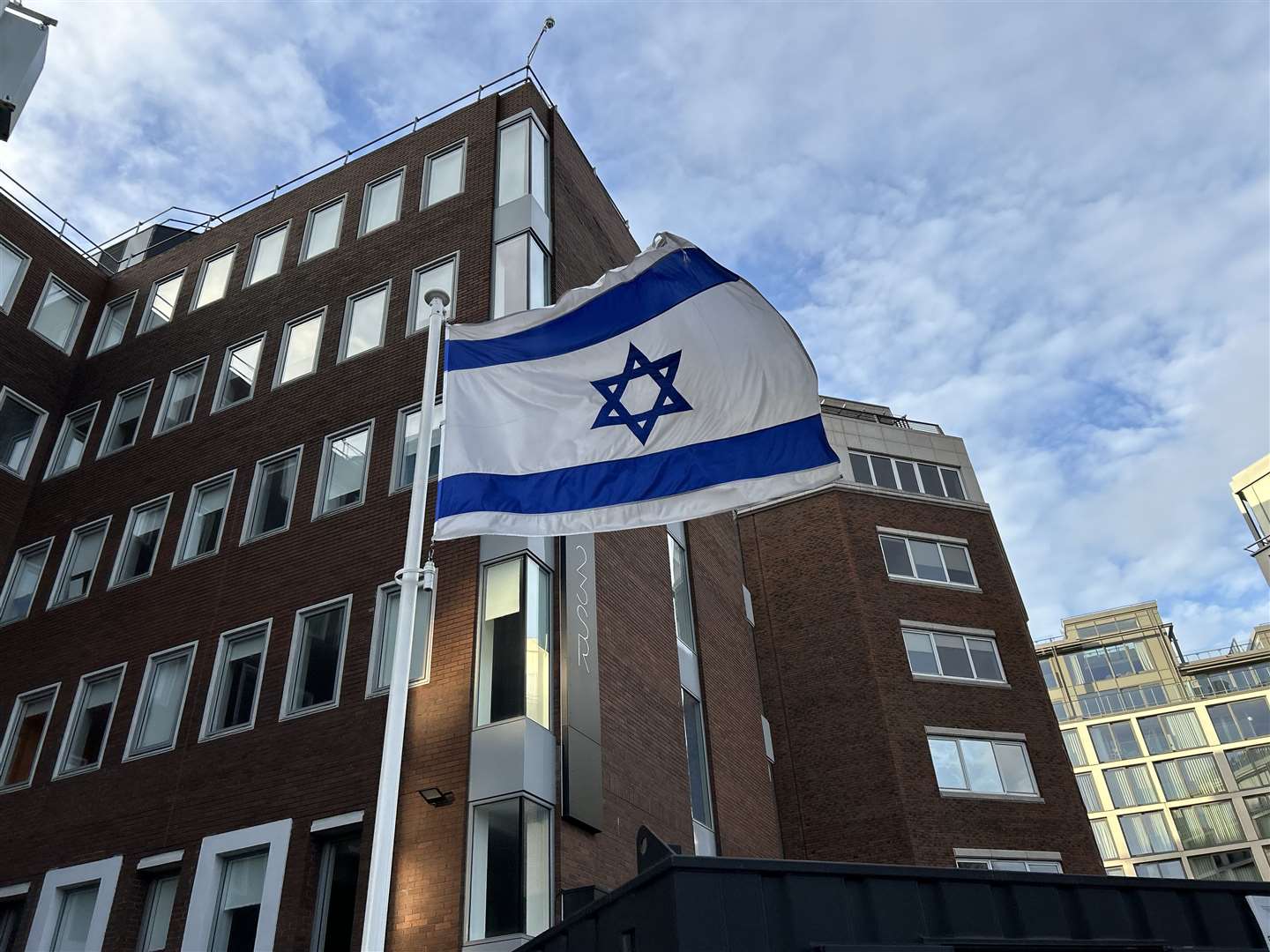 The Israeli embassy in Shelbourne Road, Dublin took down its national flag after the upcoming closure announced (Cillian Sherlock/PA)