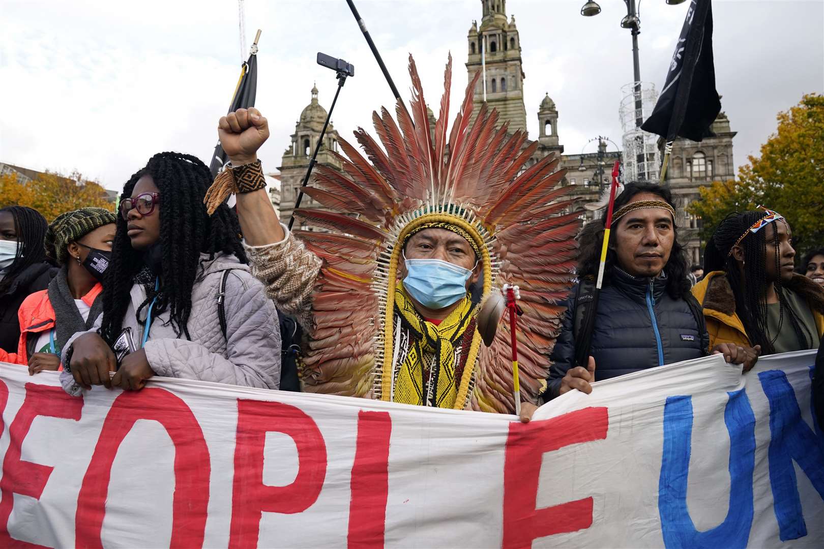 Indigenous people joined in to share the message to protect the planet (Danny Lawson/PA)