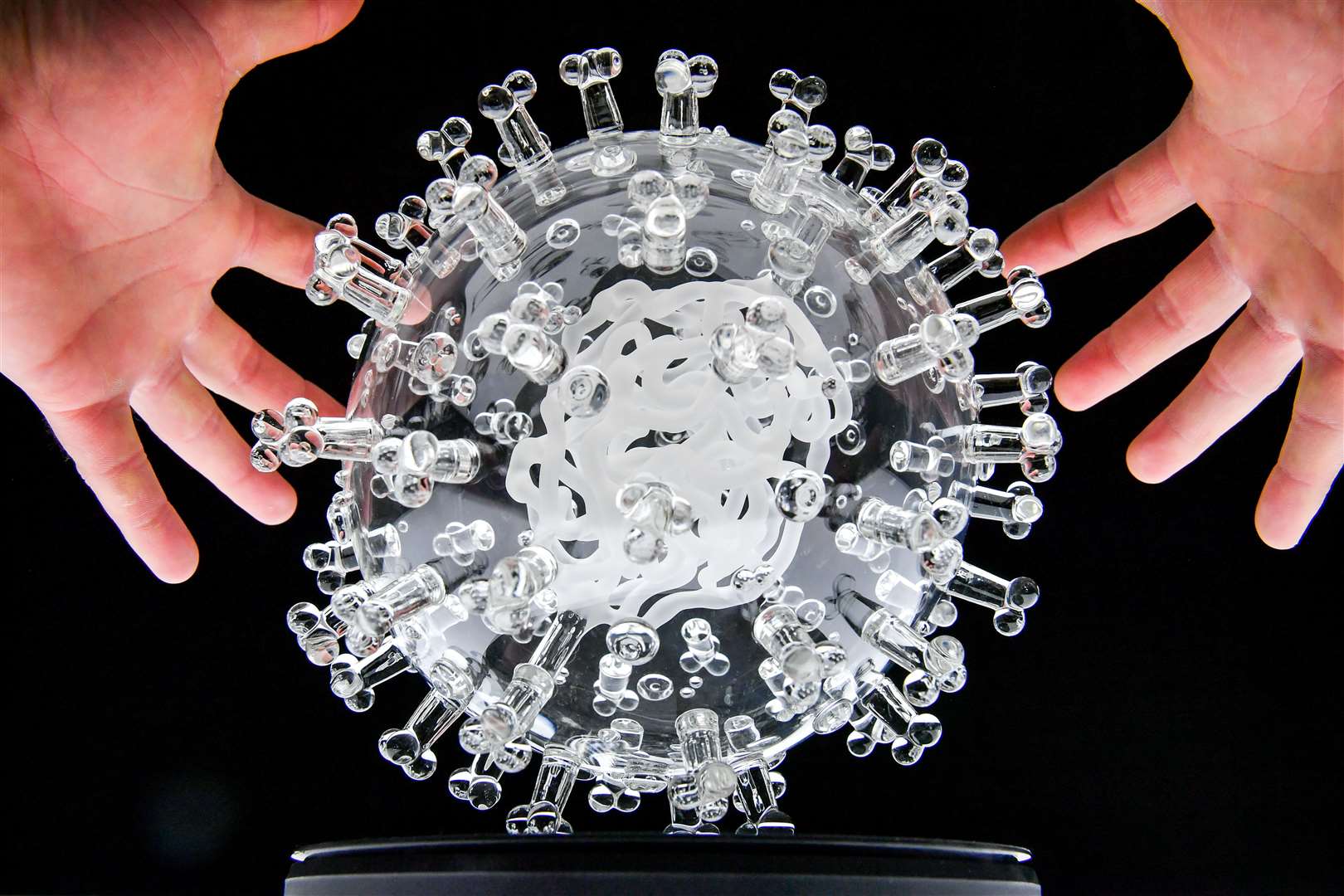 A glass sculpture of the coronavirus (Covid-19) by Bristol-based artist Luke Jerram (Ben Birchall/PA)