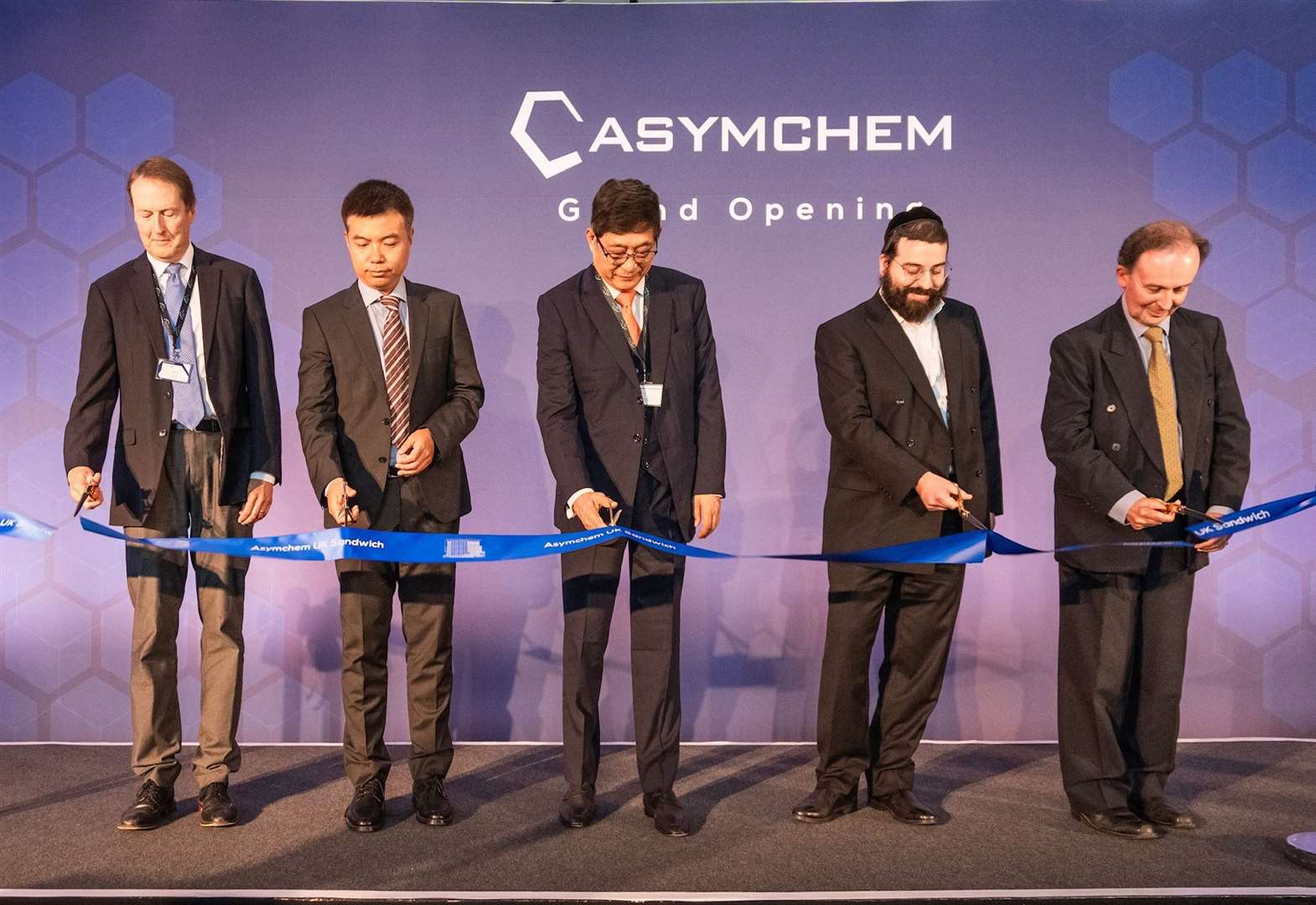 Dr Hao Hong, CEO of Asymchem, centre, Mayer Schreiber, CEO of Discovery Park, second from right, and Kent County council leader Cllr Roger Gough (Con). Picture: Perceptive Communicators