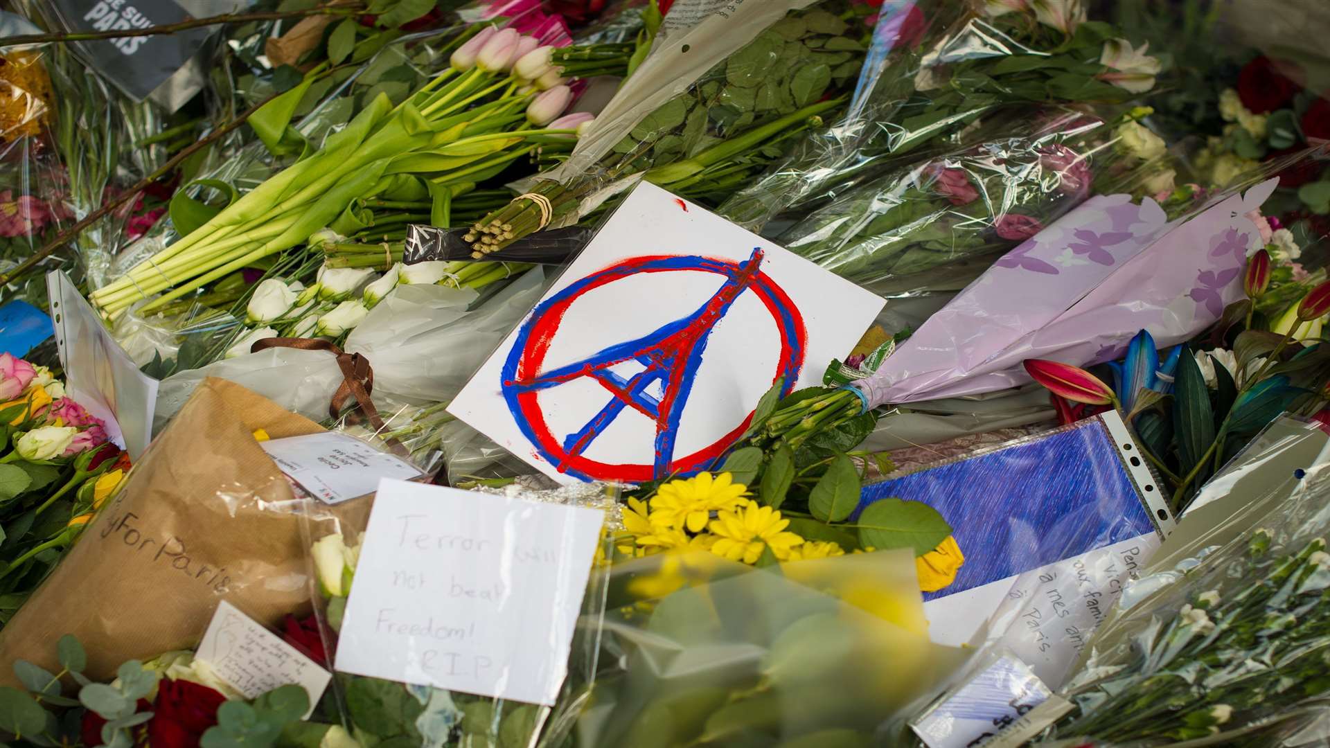 Floral tributes left outside the French Embassy in Knightsbridge, London. Picture: PA Wire/PA Images/Dominic Lipinski