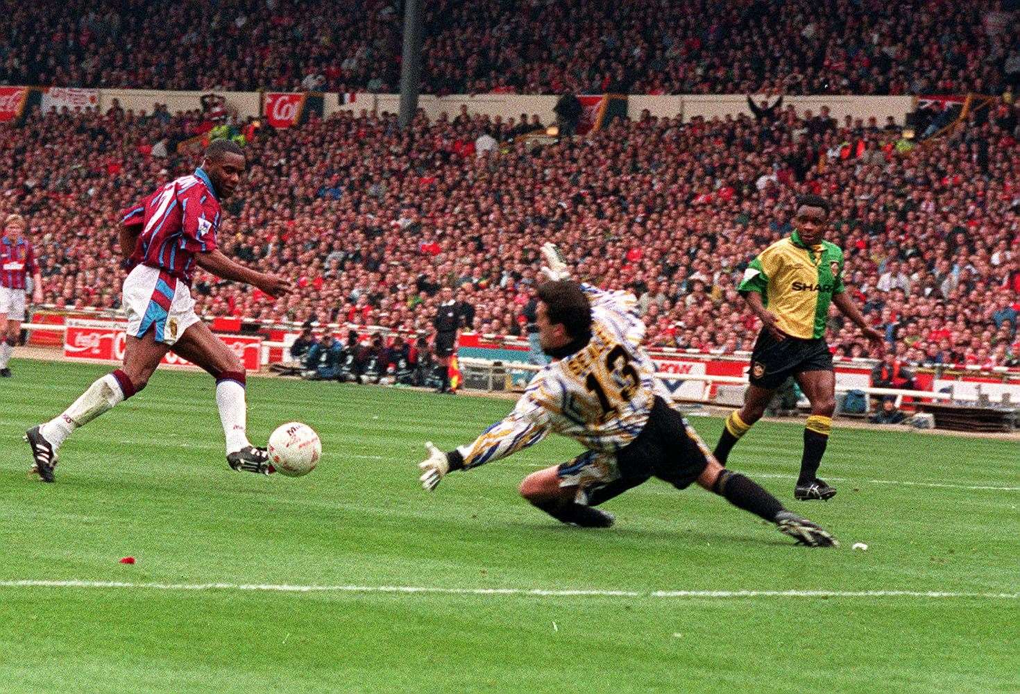 Dalian Atkinson opening the scoring against Manchester United in Aston Villa’s 1994 League Cup Final win (Tony Harris/PA)