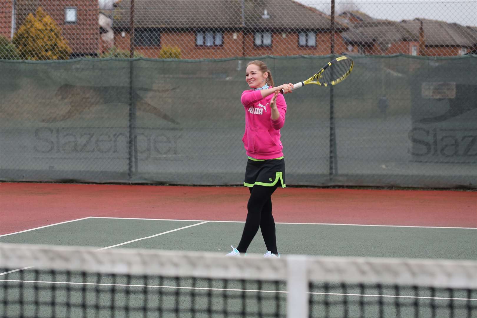 Club member Tatjana Strokatova plays singles tennis