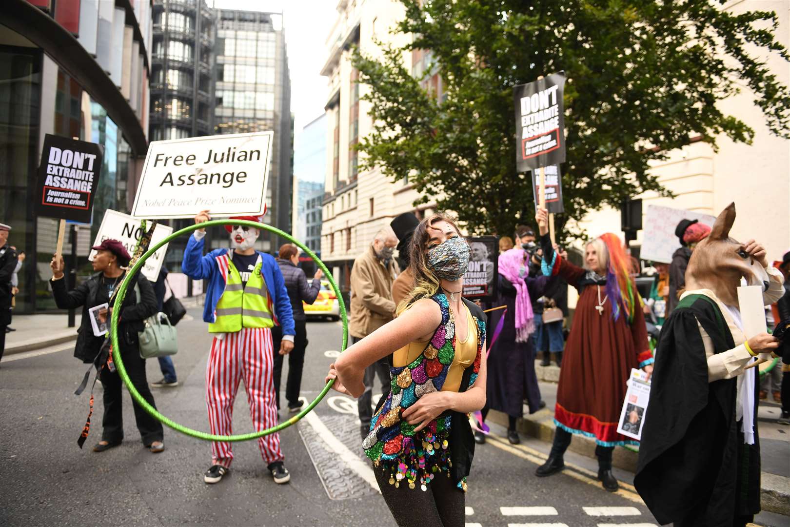 Protesters gather outside the Old Bailey (Stefan Rousseau/PA)