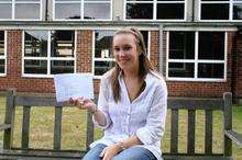 Lauren Bore of Westlands School shows off her As and Bs