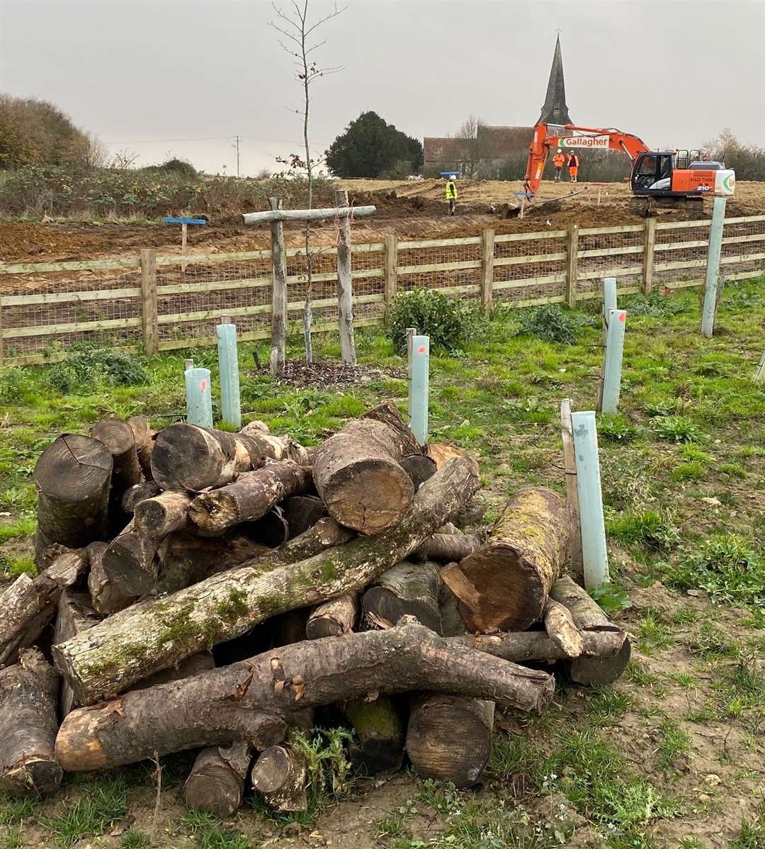 The site is overlooked by the historic Sevington church