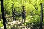 Workmen install the new gates