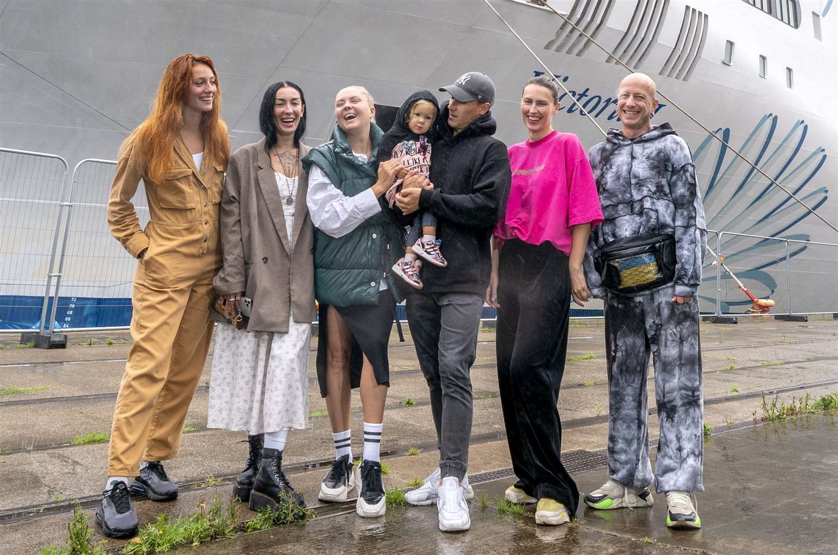 Oleksandra Kuleshyna with her father Igor Kuleshyn (third right) and other members of the Freedom Ballet of Ukraine (Jane Barlow/PA)