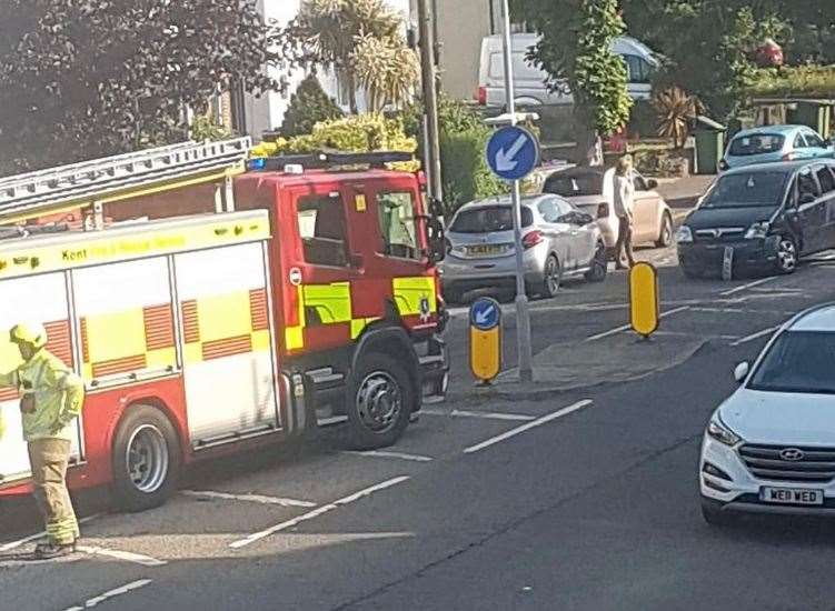 Fire crews pictured in Canterbury Road, Folkestone, following the crash this morning. Picture: Mark Champion