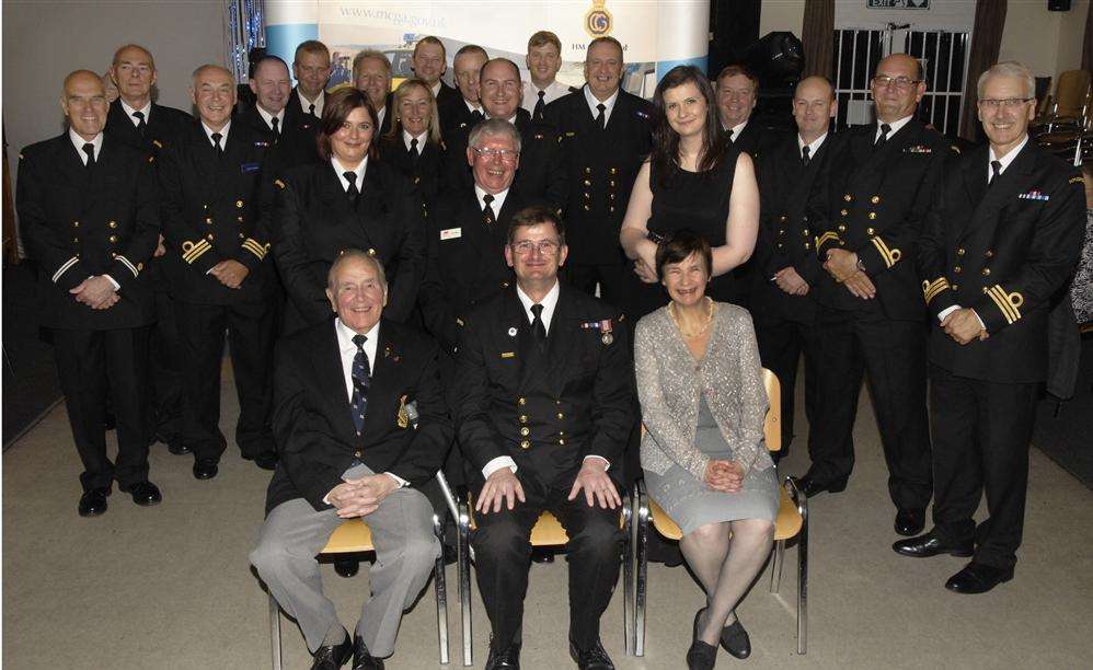 Andy Redman with family and colleagues at a celebration of his 30 year service