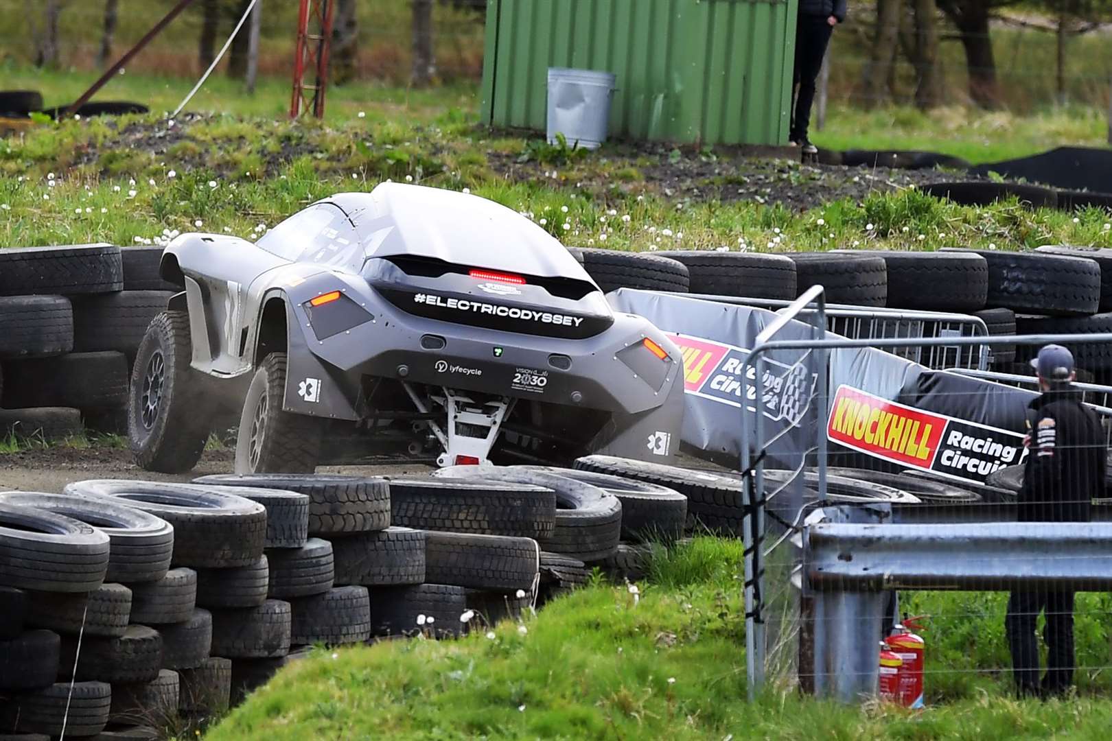 The Duke of Cambridge knocks the barrier on his last lap (Andy Buchanan/PA)