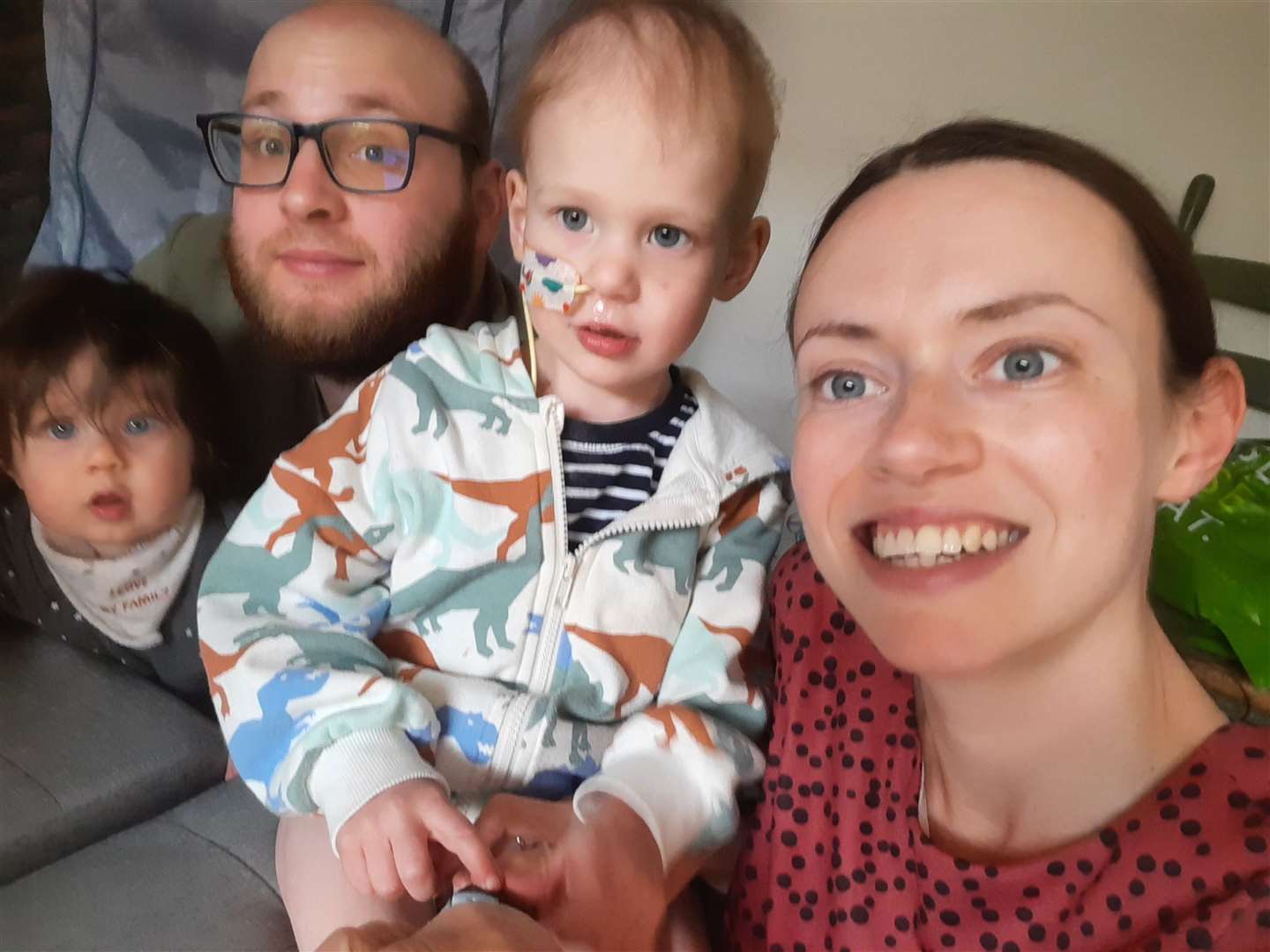 (from left to right) Teddy’s younger brother Rupert, 17 months old, Teddy’s father Alastair, 34, Teddy, 4, and Kat, 34 (Kat Lichten/PA)