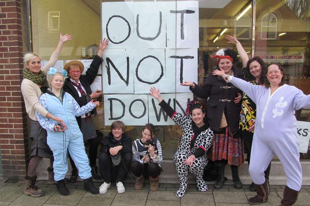 Staff and volunteers at Strood Community Project's charity shop on their final day of trading