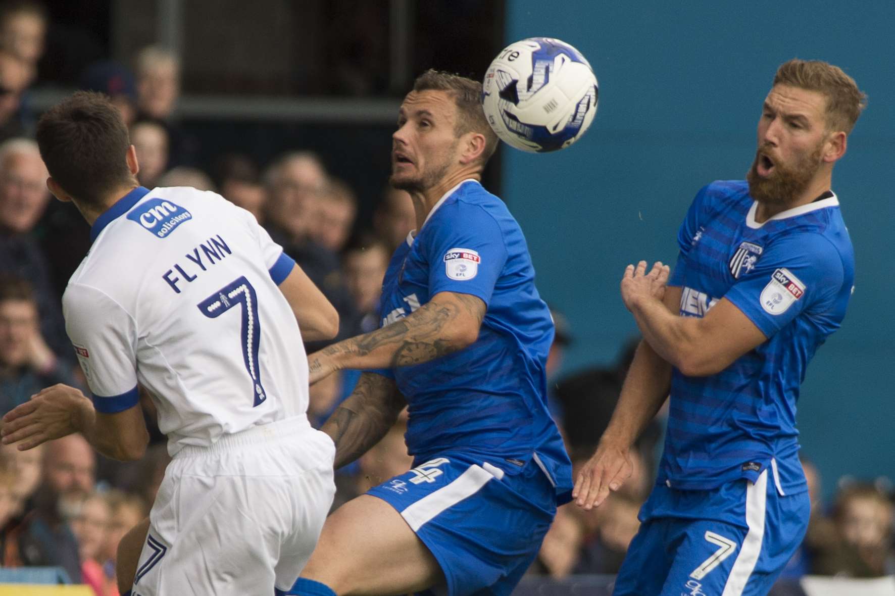 Chris Herd and Scott Wagstaff team up against Oldham's Ryan Flynn Picture: Andy Payton