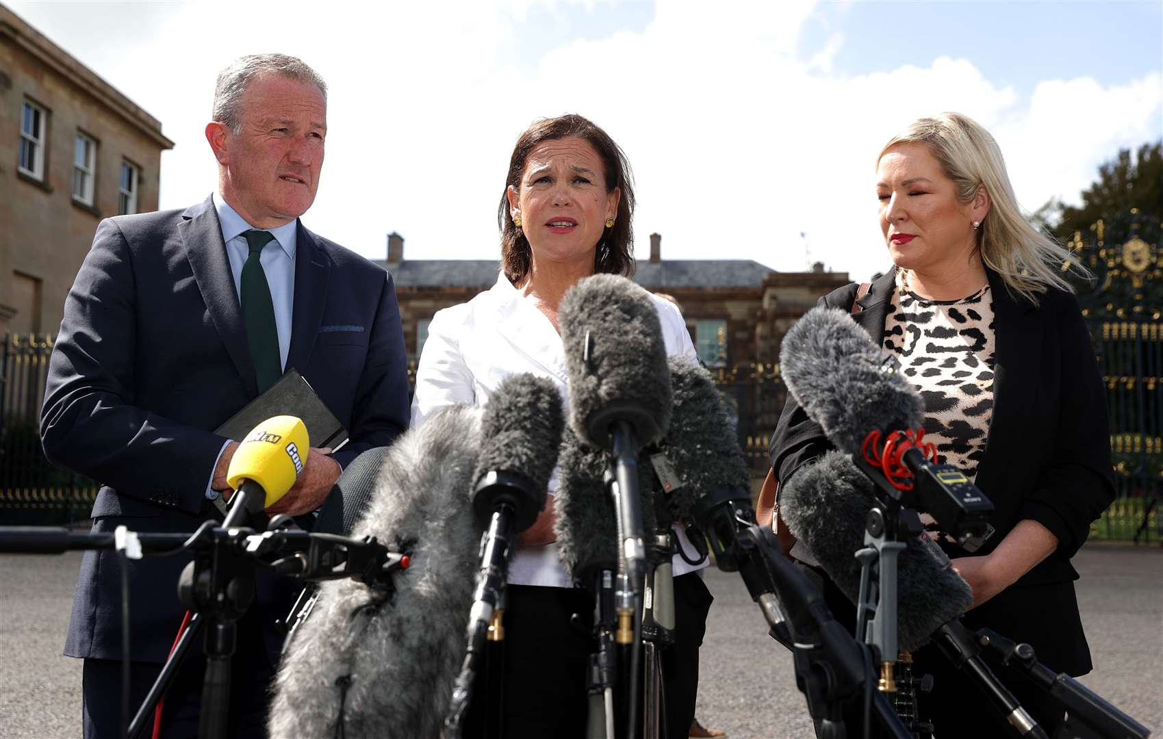 Mary Lou McDonald (centre) with Conor Murphy (left) and Michelle O’Neill (right) (Liam McBurney/PA)