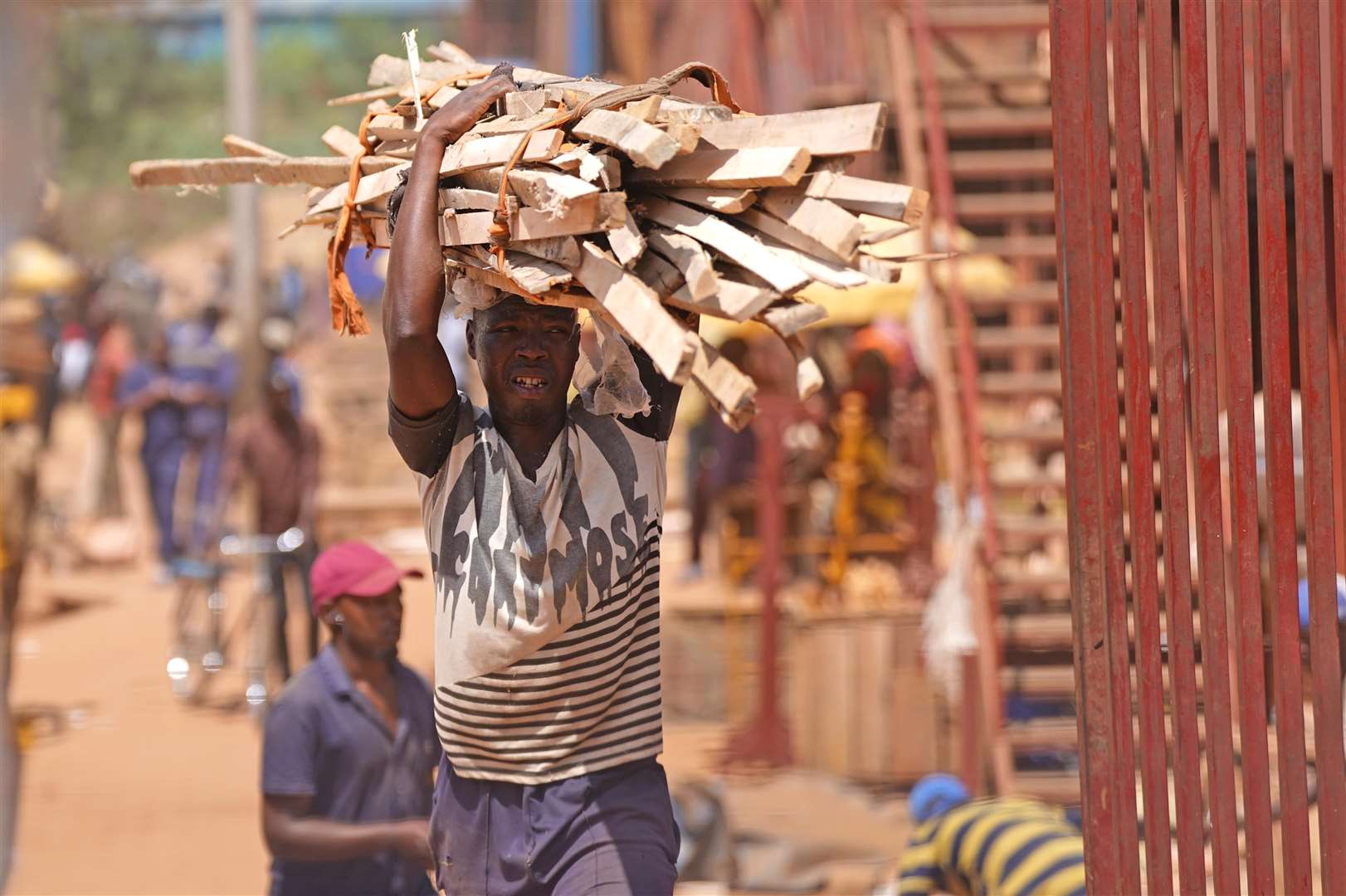 TPeople in the Rwandan capital, Kigali (Victoria Jones/PA)