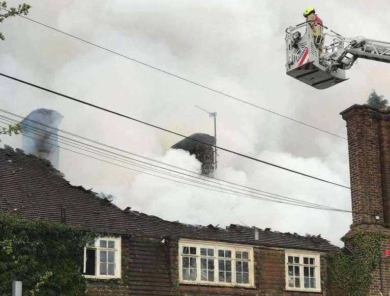 Crews are using a height vehicle to tackle the blaze. Picture: Kent Fire and Rescue Service
