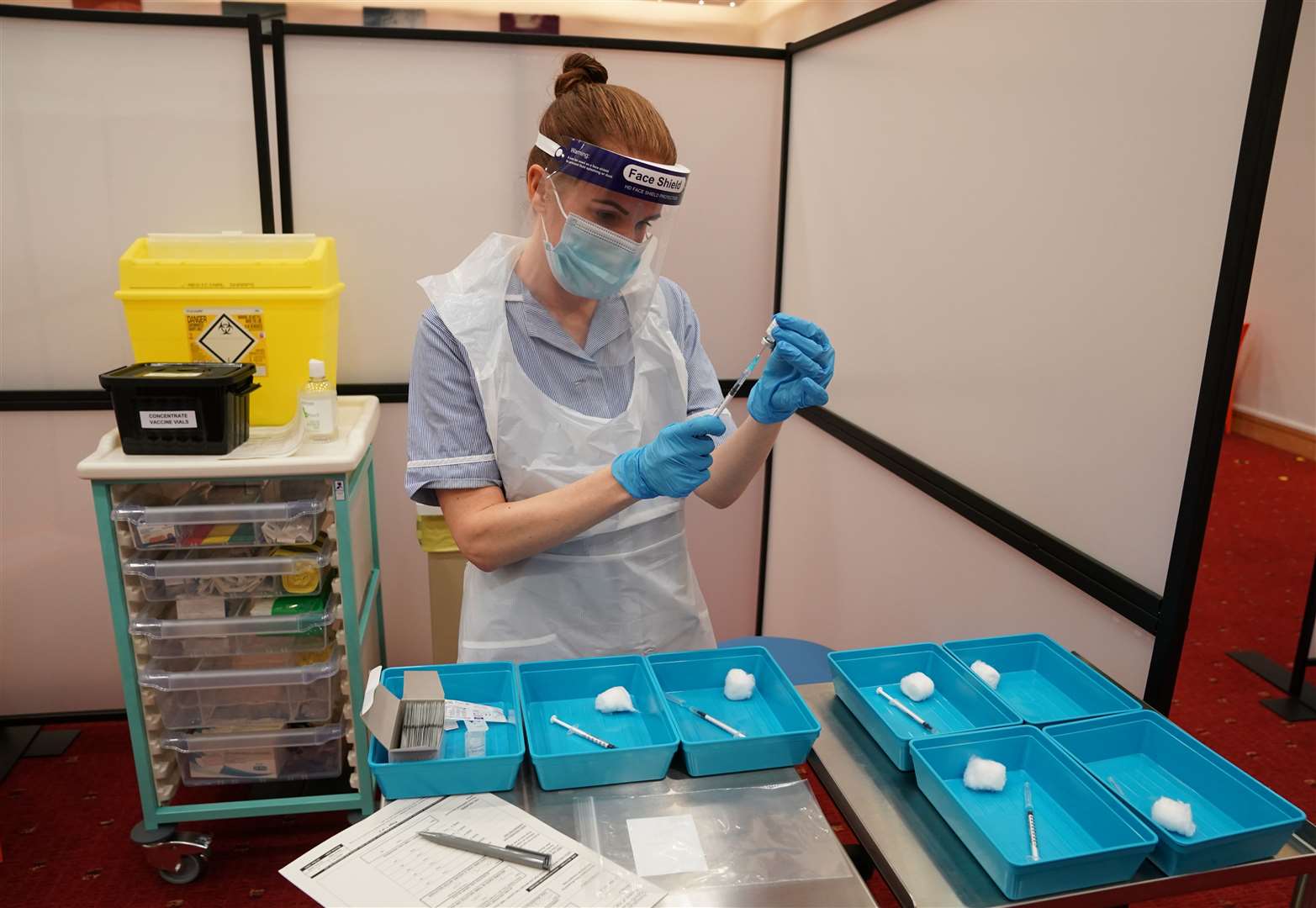 Covid-19 vaccines being prepared for health and social care workers at the Centre for Life in Newcastle (Owen Humphreys/PA)