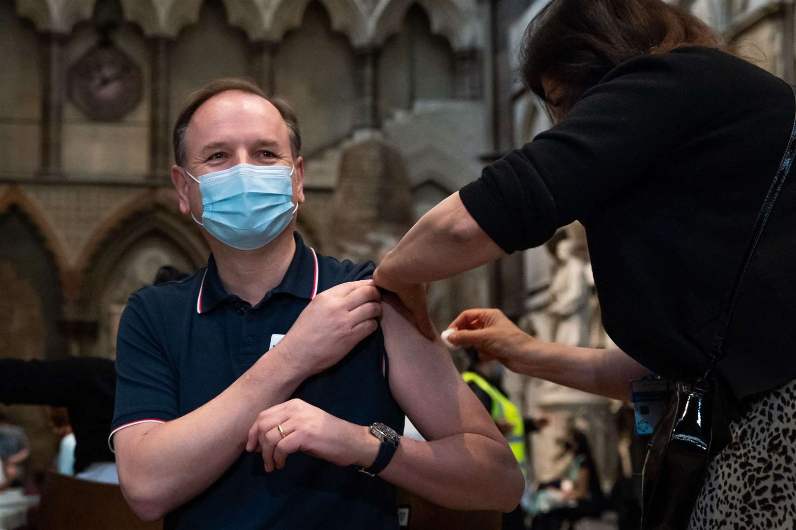 Sir Simon Stevens pictured in March receiving his coronavirus vaccine (Aaron Chown/PA)