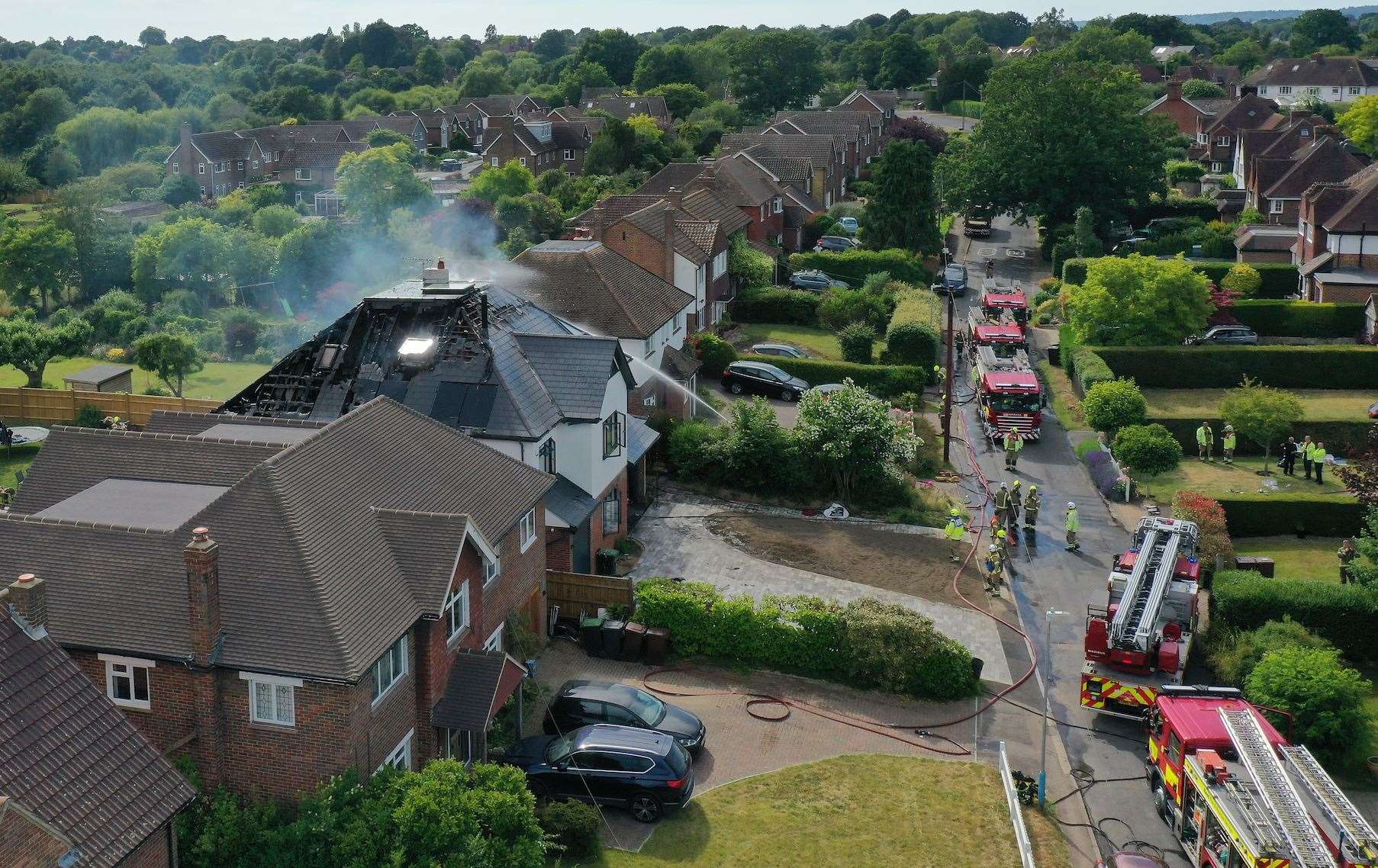 Firefighters tackling the blaze in Old Hadlow Road, Tonbridge. Picture: UKNIP