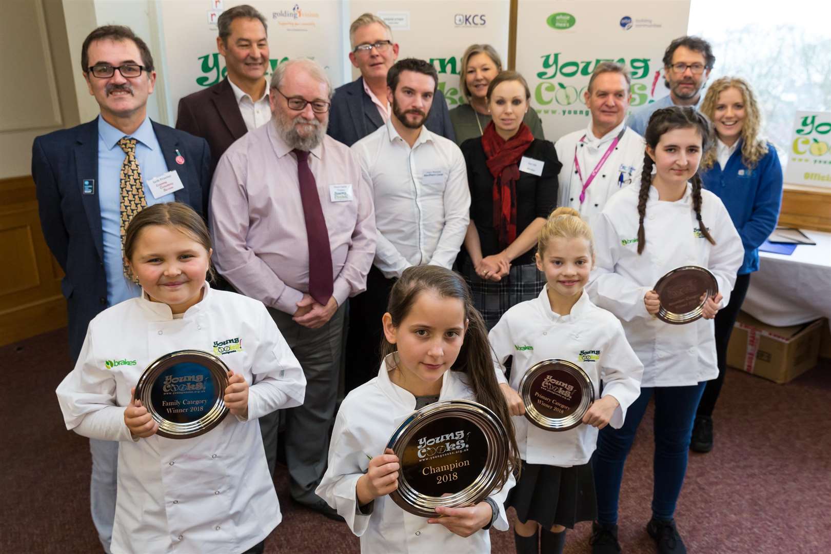 Front row (from left) Young Cooks 2018 winners Brooke Keen, Boglar Bote-Godri, Amelia Phillips, and Amelia Page with judges and supporters of the contest.