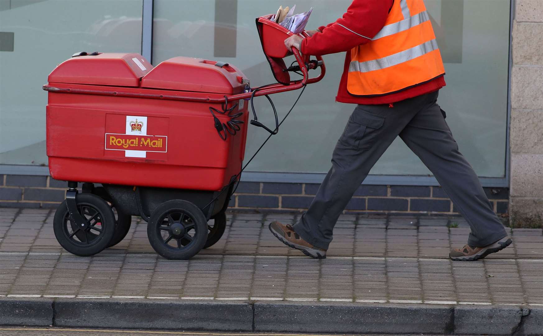 Royal Mail currently operates letter deliveries six days a week (Steve Parsons/PA)